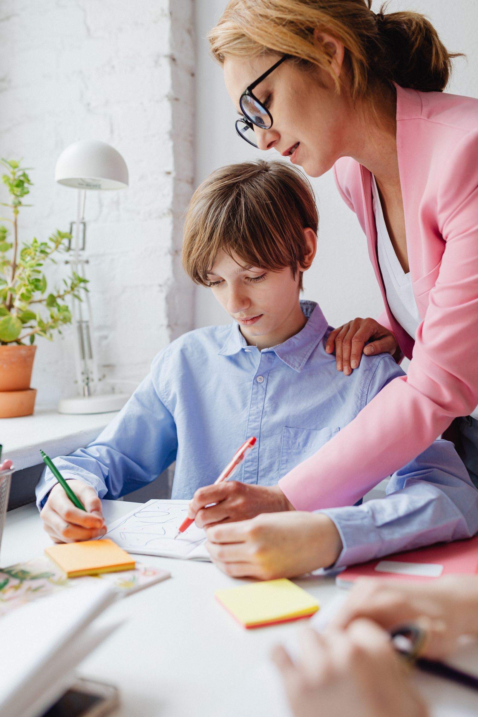 Teacher helping a student one-on-one